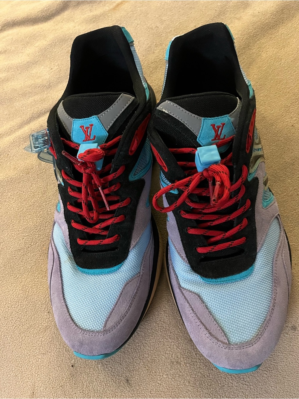 Louis Vuitton Men’s Multicolor Sneakers — Light Blue & Red Accents